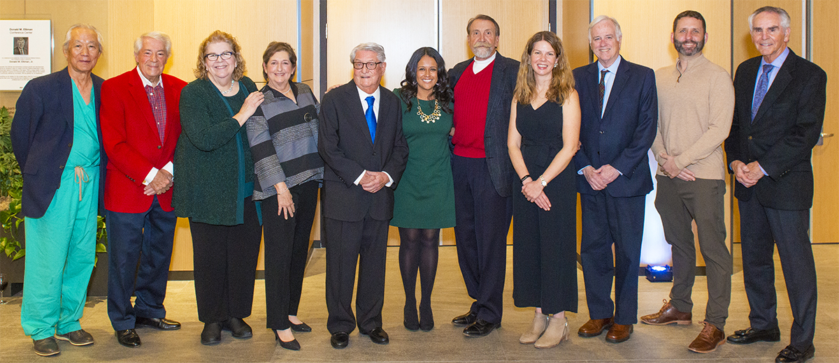 Alumni representatives standing in event space