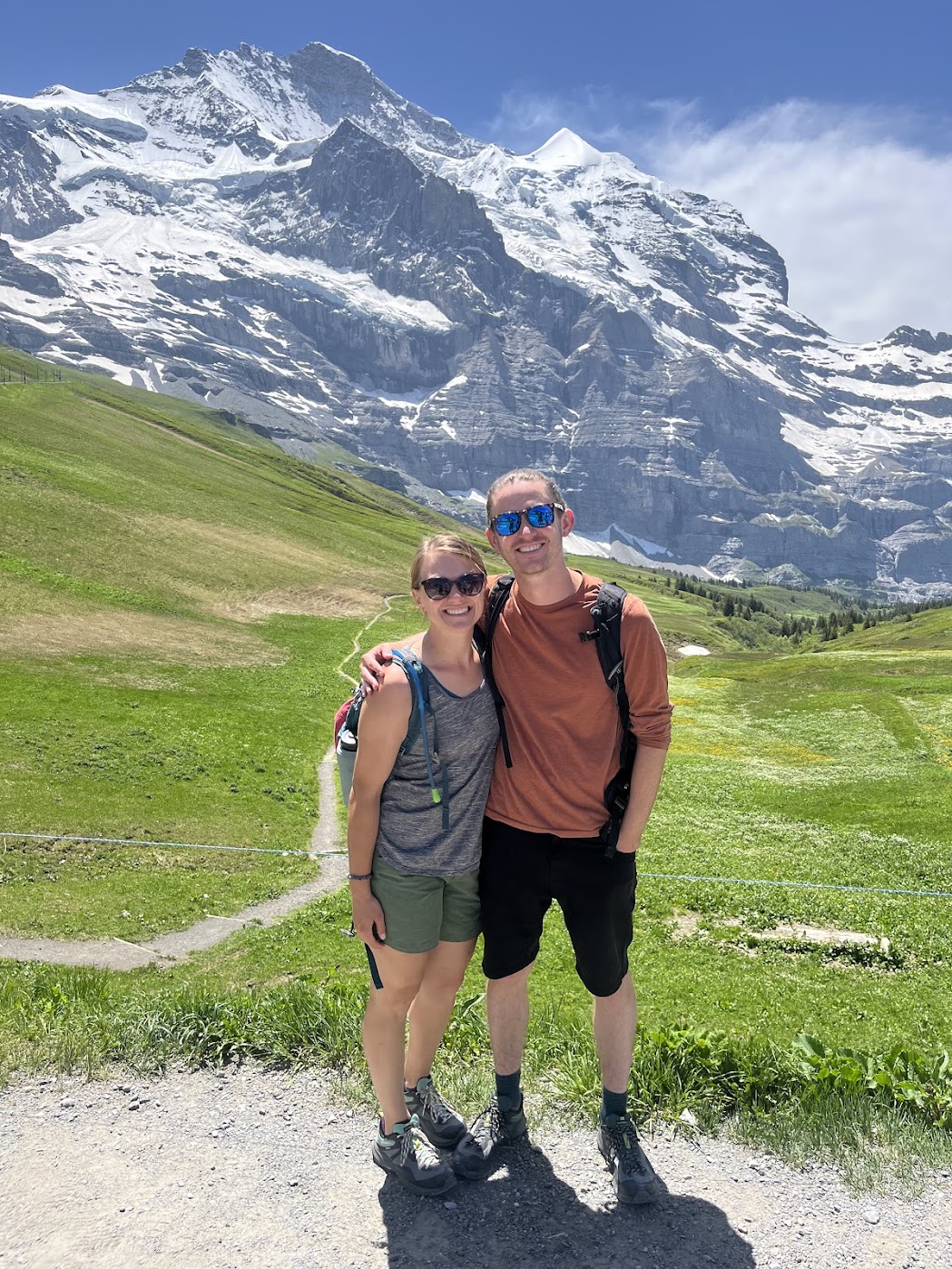 Photo of Dr. Koerber standing next to a man in the mountains.